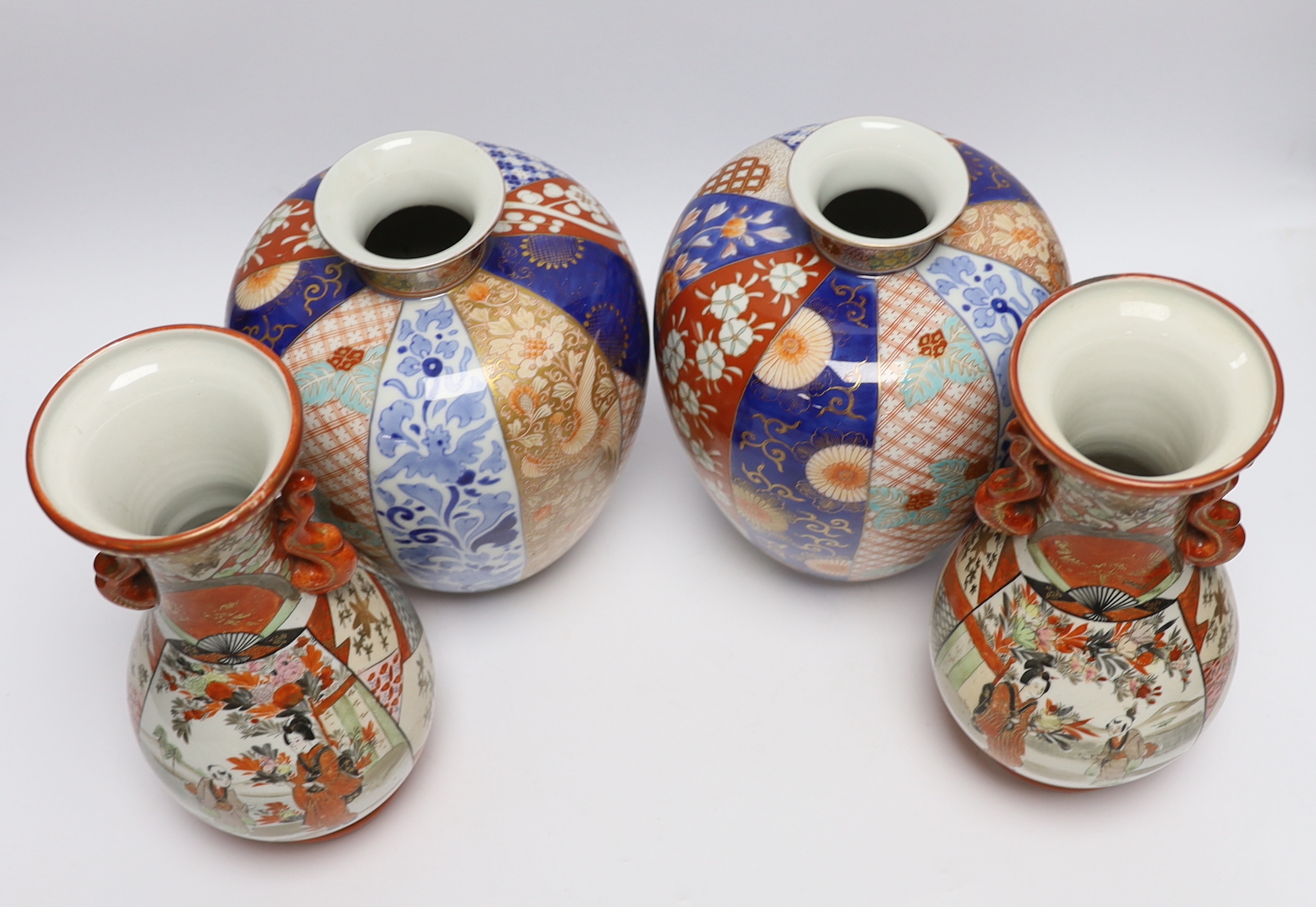 A pair of Japanese Imari vases, by Fukagawa and a pair of Kutani vases, Meiji period, tallest 25cm